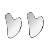 أداة غوا شا (Gua Sha) من ستانلس ستيل – تدليك الوجه، شدّ البشرة، أداة تجميل معدنية